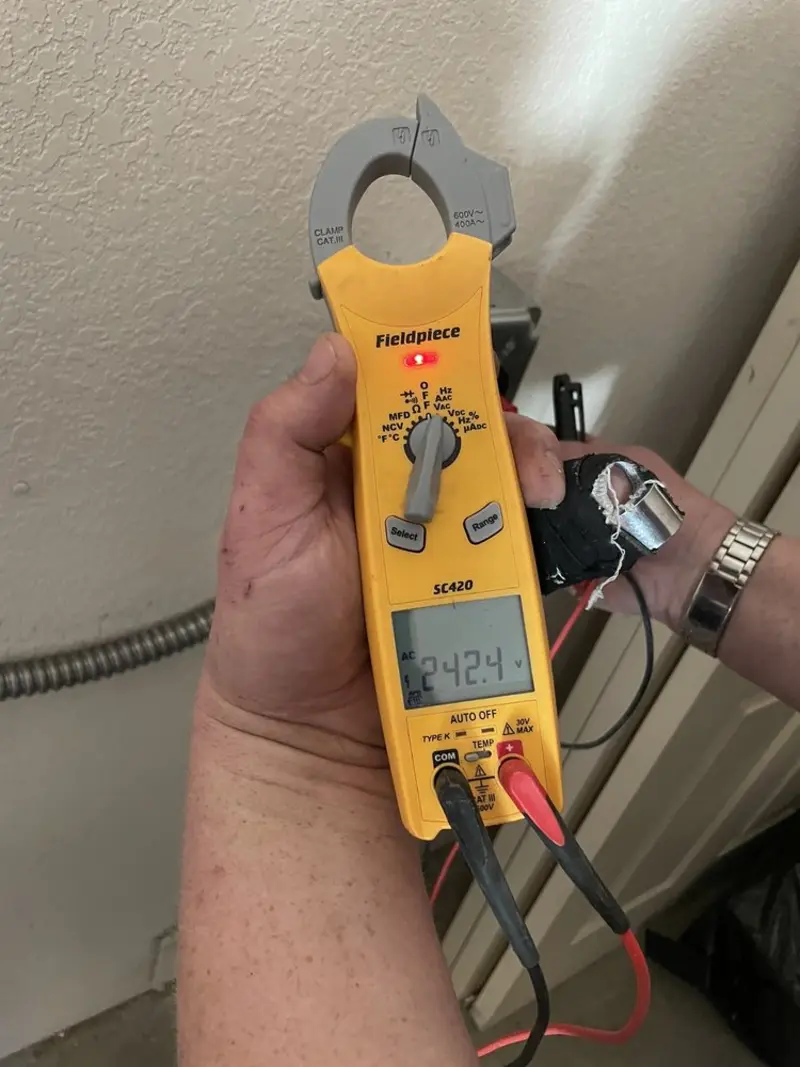 Voltage testing with clamp meter during Generator Installation in Jeannette
